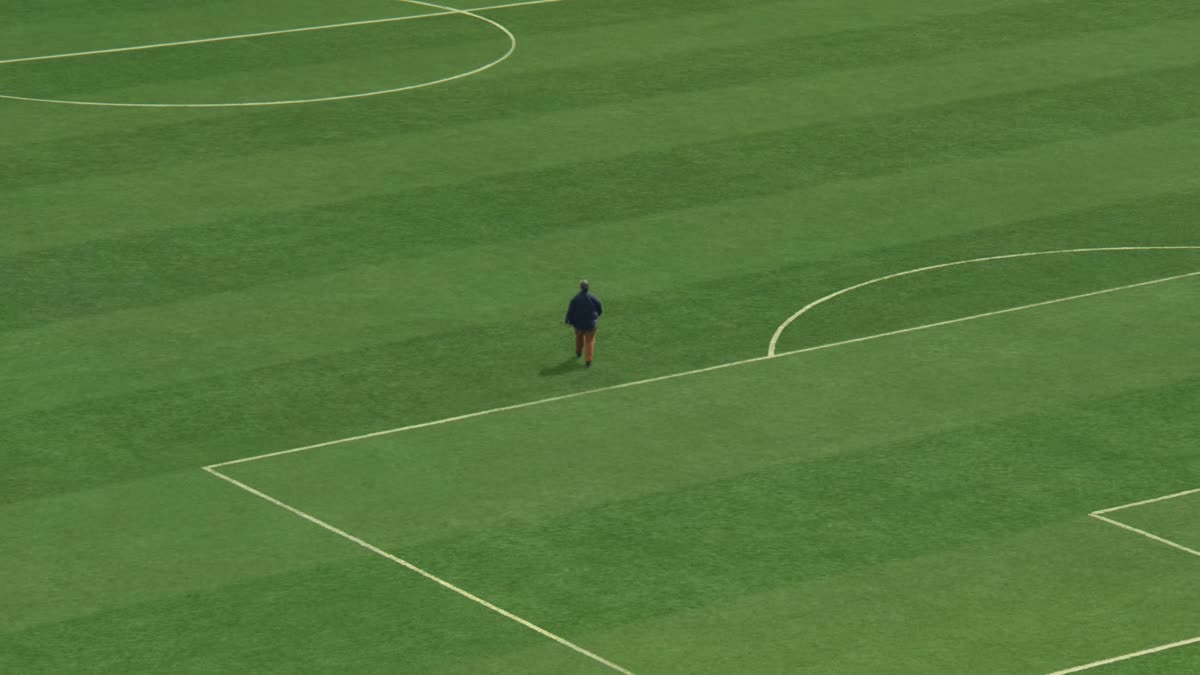 A groundskeeper crossing the BC Place pitch